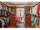 Walk-in closet with custom shelving, drawers, and storage solutions for organization at 1175 Lamont Cir, Dacula, GA 30019