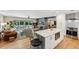 Stylish kitchen and living room area featuring granite counters and stainless steel appliances at 1959 Grand Prix Ne Dr, Atlanta, GA 30345
