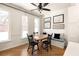 Sunny dining area with natural light, a ceiling fan and built in bench at 651 Park Village Ne Dr, Atlanta, GA 30306