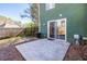 A concrete patio presents a clean, blank canvas ready for outdoor living in the backyard at 845 Regal Path Ln, Decatur, GA 30030