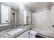 Bathroom featuring granite counters, a shower-tub combination, and modern fixtures, all designed for comfort and functionality at 845 Regal Path Ln, Decatur, GA 30030