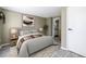 Bedroom showcases decor with a large bed, stylish accents, and convenient access to the ensuite bathroom for a relaxing retreat at 845 Regal Path Ln, Decatur, GA 30030