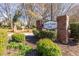 Entrance sign to Royal Towne Park, landscaped with lush greenery and brick pillars for a welcoming community atmosphere at 845 Regal Path Ln, Decatur, GA 30030