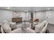 Inviting finished basement with stylish seating, modern decor, and ample space for relaxation and entertainment at 1233 Poplar Grove Ne Dr, Atlanta, GA 30306