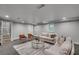 Basement living room with neutral walls, carpet and modern furniture at 1233 Poplar Grove Ne Dr, Atlanta, GA 30306