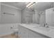 Modern bathroom with double sinks and vanities, providing a clean and functional space at 1233 Poplar Grove Ne Dr, Atlanta, GA 30306