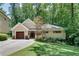 Charming single-Gathering home with a manicured lawn and a private driveway at 1233 Poplar Grove Ne Dr, Atlanta, GA 30306
