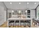 Modern kitchen with stainless steel appliances, granite countertops, and custom cabinets at 1233 Poplar Grove Ne Dr, Atlanta, GA 30306