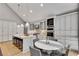 Bright kitchen with stainless steel appliances, granite countertops, and custom cabinets at 1233 Poplar Grove Ne Dr, Atlanta, GA 30306
