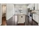 Bright and airy kitchen with a large island, stainless steel appliances and granite countertops at 1829 Hislop Ln, Atlanta, GA 30345