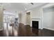 Spacious living room with an open layout, fireplace, and seamless transition to the kitchen at 1829 Hislop Ln, Atlanta, GA 30345