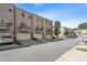 Street view of new townhomes with garages and balconies at 1829 Hislop Ln, Atlanta, GA 30345