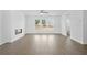 Spacious living room featuring a modern fireplace and a beautiful view at 3190 Eastham Run Dr, Dacula, GA 30019