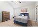 Neutral bedroom with a ceiling fan and a light blue bed frame at 3314 Ridge Manor Way, Dacula, GA 30019