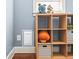 Bedroom with toy storage shelves, a small window, and blue painted walls at 3314 Ridge Manor Way, Dacula, GA 30019