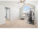 Carpeted bonus room with a window and home gym equipment at 3314 Ridge Manor Way, Dacula, GA 30019
