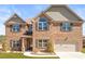 Charming two-story brick home with well-manicured lawn and inviting curb appeal at 3314 Ridge Manor Way, Dacula, GA 30019
