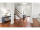 Inviting foyer with hardwood floors, high ceilings, and elegant staircase at 3314 Ridge Manor Way, Dacula, GA 30019
