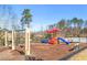 Community playground with slides, swings, and climbing structure at 3314 Ridge Manor Way, Dacula, GA 30019