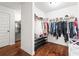 Spacious walk-in closet with ample shelving and hanging space for organized storage at 3314 Ridge Manor Way, Dacula, GA 30019
