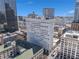 Stunning aerial view of the building with a beautiful clear blue sky in the background and surrounding architecture at 57 Forsyth Nw St # 16D, Atlanta, GA 30303