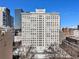 Detailed aerial view of the building showcasing its unique design with the surrounding architecture and lovely park at 57 Forsyth Nw St # 16D, Atlanta, GA 30303