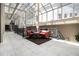 Inviting atrium space with a glass ceiling, seating, and elegant marble floors at 57 Forsyth Nw St # 16D, Atlanta, GA 30303