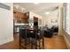 Open-concept kitchen and living area with wood floors and stainless steel appliances at 57 Forsyth Nw St # 16D, Atlanta, GA 30303