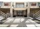 Grand lobby entrance featuring dual staircases and elegant architectural details at 57 Forsyth Nw St # 16D, Atlanta, GA 30303