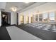 Spacious lobby with a checkered floor and tall windows offering city views at 57 Forsyth Nw St # 16D, Atlanta, GA 30303