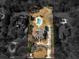 A captivating aerial shot of an estate featuring a kidney-shaped pool nestled within a verdant landscape and luxury homes at 8531 N Shore Dr, Jonesboro, GA 30236