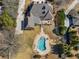 Drone shot revealing a private pool, spacious deck, and mature trees surrounding this beautiful property at 8531 N Shore Dr, Jonesboro, GA 30236