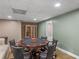 Basement game table area with seating at 8531 N Shore Dr, Jonesboro, GA 30236