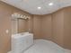 Bathroom with a double sink vanity, classic mirror and decorative lighting at 8531 N Shore Dr, Jonesboro, GA 30236