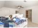 Cozy bedroom with a ceiling fan, double closet, and natural light at 8531 N Shore Dr, Jonesboro, GA 30236