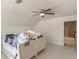 Neutral bedroom with a ceiling fan and double closet at 8531 N Shore Dr, Jonesboro, GA 30236