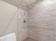 Shower with neutral tiles at 8531 N Shore Dr, Jonesboro, GA 30236