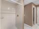 Updated bathroom features a spacious tiled shower with modern fixtures at 8531 N Shore Dr, Jonesboro, GA 30236