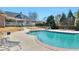 Beautiful backyard pool with ample patio space, perfect for entertaining and relaxing outdoors at 8531 N Shore Dr, Jonesboro, GA 30236