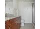 Bathroom with granite counters, wood vanity, and shower-tub combination at 860 Peachtree St # 1418, Atlanta, GA 30308
