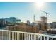 A captivating city view from a rooftop showcasing architectural diversity and construction progress at 860 Peachtree St # 1418, Atlanta, GA 30308
