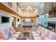Elegant clubhouse with sofas, pool table, large windows, and cozy fireplace at 860 Peachtree St # 1418, Atlanta, GA 30308