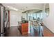 Stylish kitchen with wood cabinets, stainless appliances, and views of the city at 860 Peachtree St # 1418, Atlanta, GA 30308