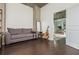 Cozy living room with hardwood floors, neutral decor, and a modern aesthetic at 860 Peachtree St # 1418, Atlanta, GA 30308