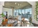 Open living space with floor to ceiling windows providing plentiful natural light and city views at 860 Peachtree St # 1418, Atlanta, GA 30308