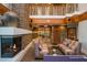 Inviting lobby area with fireplace, seating, and stone accent walls at 860 Peachtree St # 1418, Atlanta, GA 30308