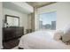 Bright main bedroom featuring hardwood floors, city views and a contemporary aesthetic at 860 Peachtree St # 1418, Atlanta, GA 30308