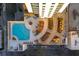 Aerial view of a rooftop pool and garden area with seating and walkways at 860 Peachtree St # 1418, Atlanta, GA 30308