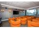 Cozy theater room featuring comfortable seating, mounted sconces, and a large flat screen at 860 Peachtree St # 1418, Atlanta, GA 30308