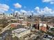 An aerial view showcasing the historic complex and the city skyline at 170 Boulevard Se # H428, Atlanta, GA 30312